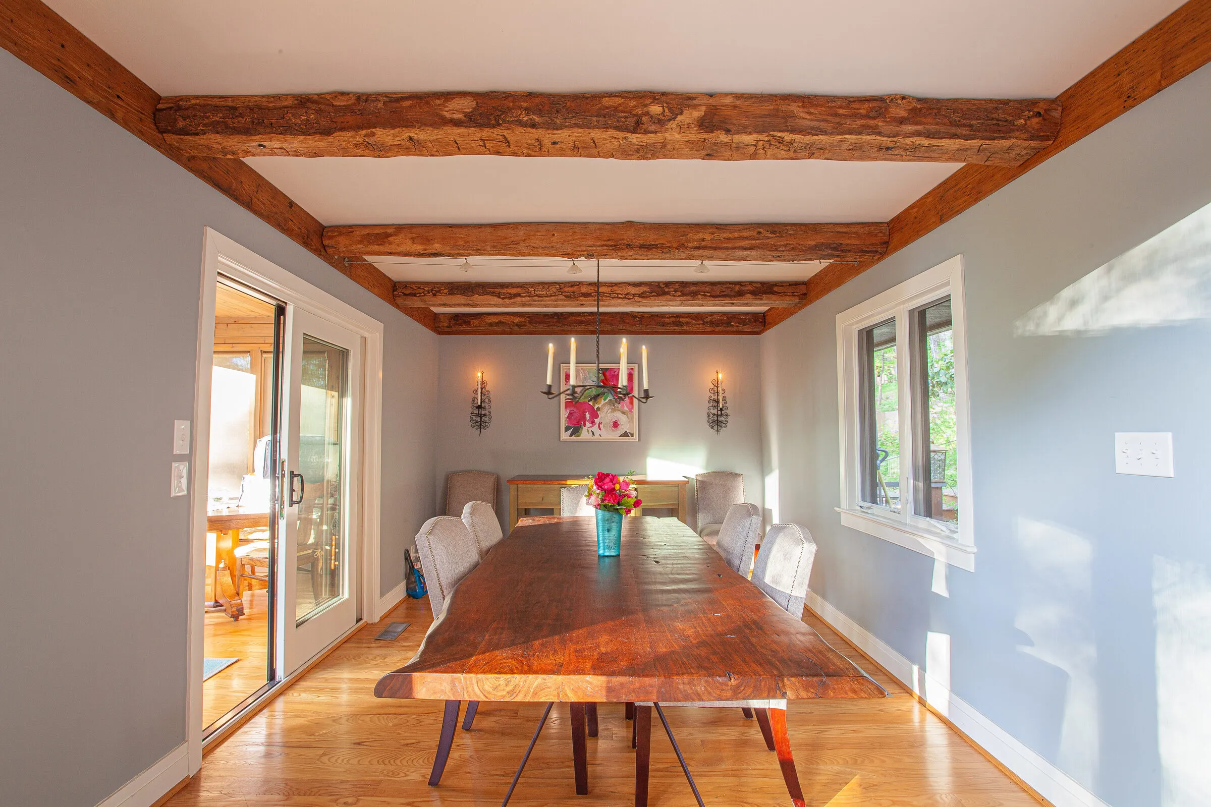 Dining table under exposed beams
